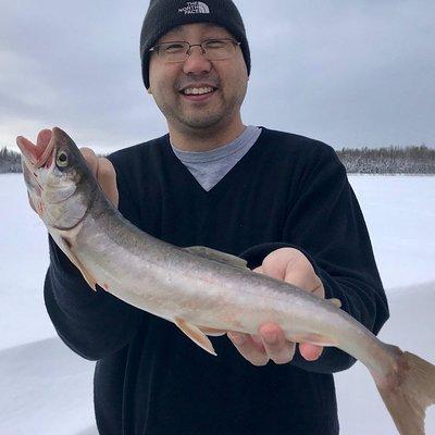 Fairbanks Ice Fishing Expedition in a Heated Cabin with Fish Cookout