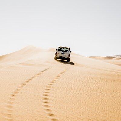 From Cairo: Desert Safari, Waterfalls, Sand boarding and Camel ride with Lunch