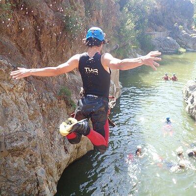 From Mijas: Guadalmina Canyon Canyoning Tour